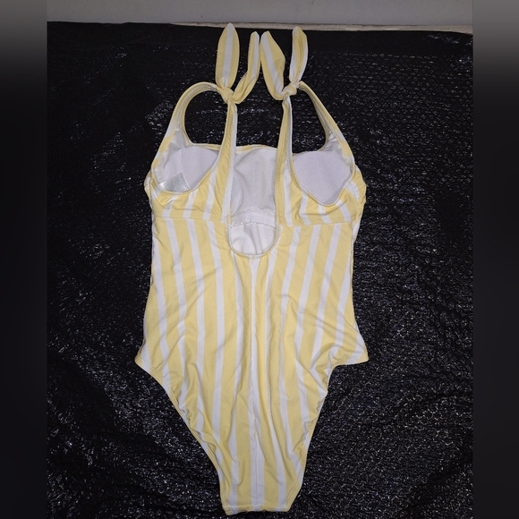 A Kona Sol yellow striped one-piece bikini in a size medium with shoulder ties. - Picture 2 of 4